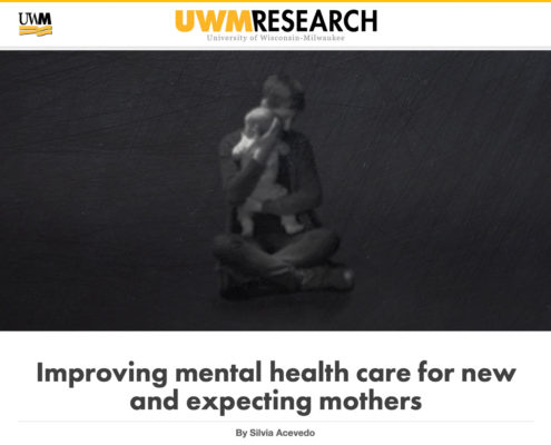 Image shows a woman holding a child and accompanies the article entitled "Improving mental health care for new and expecting mothers", written by Silvia Acevedo and published Feb. 12, 2019, in UWM Research magazine.