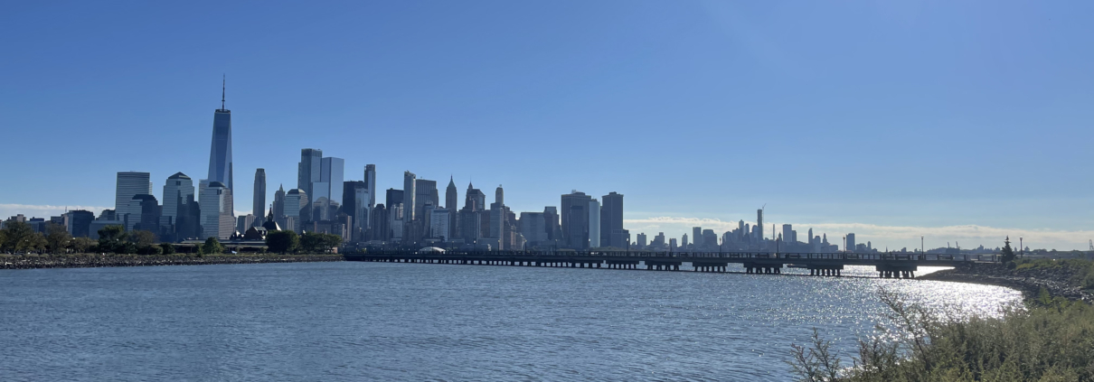 Photo shows Manhattan skyline from beautiful Liberty State Park adjacent to the Statute of Liberty