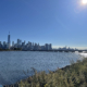 Photo shows Manhattan skyline from beautiful Liberty State Park adjacent to the Statute of Liberty