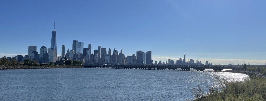 Photo shows Manhattan skyline from beautiful Liberty State Park adjacent to the Statute of Liberty