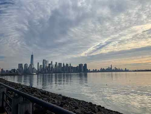 Manhattan skyline under a stormy sky