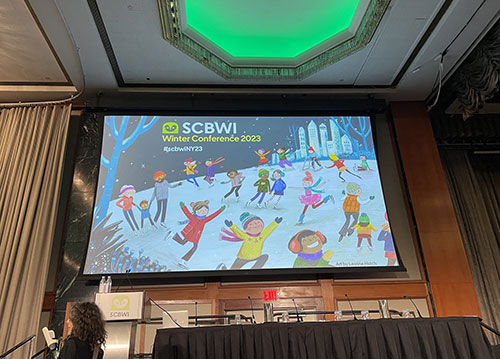 Photo shows opening slide of SCBWI New York City conference
