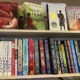 Image shows a bookshelf with books