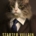Image shows book cover -- a cat from the shoulders up, it wearing a business suit, against a black background, the book title in yellow typeface.